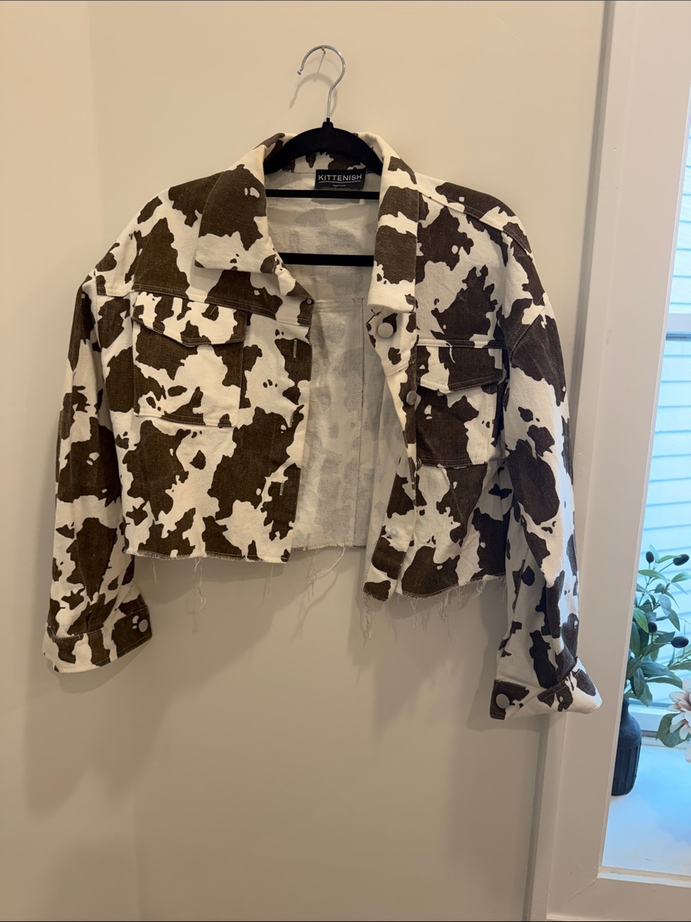 Kittenish Cropped Cow-Print Jean Jacket in Brown & White